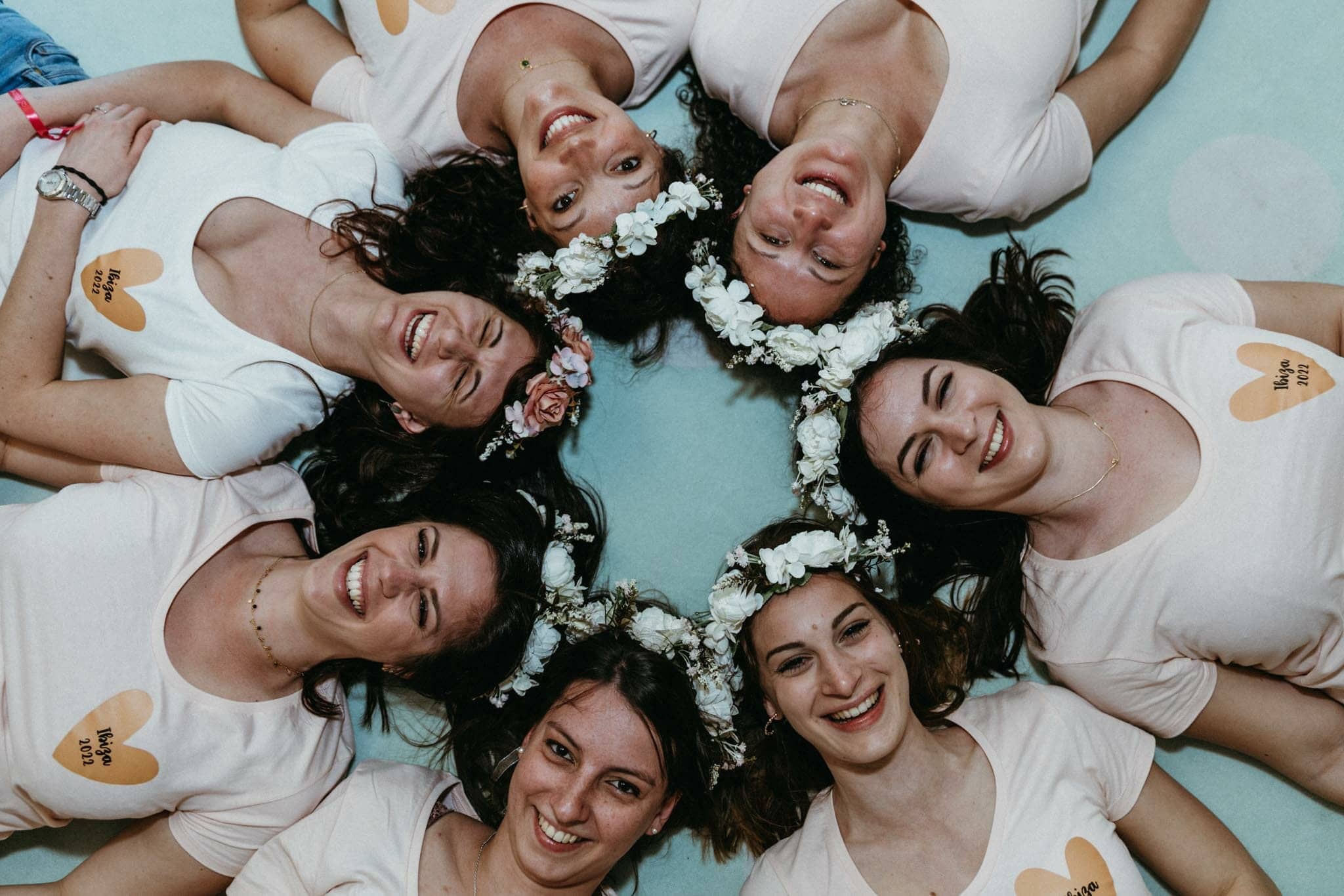 image of photo of friends with flower crown in their hair